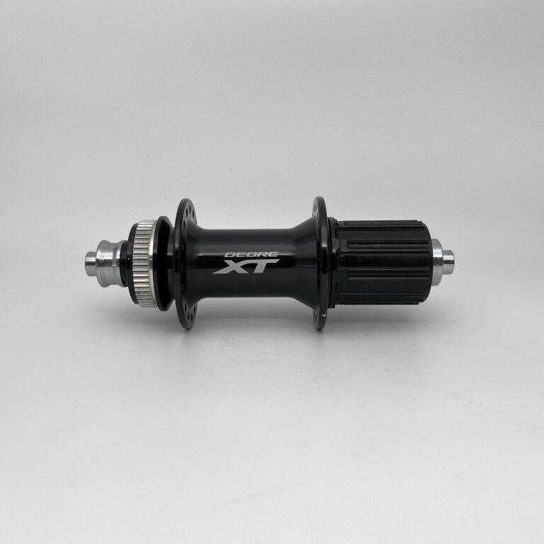 Rear hub / 135 MM / Drop axle / Disc (Centerlock) / 32GTS / Shimano / FH-M8000 Deore XT / HG Body 35 MM  / Black / MTB