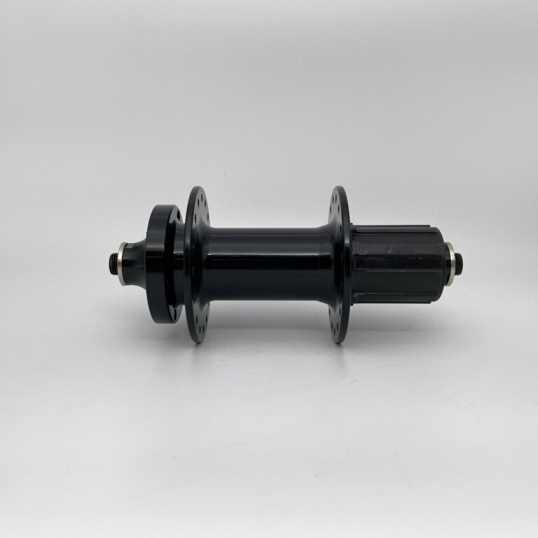 Rear hub / 141 MM / Drop axle / Disc (6 bolts) / 32GTS / Import / UNI / HG Body 35 MM / Black / Trek X-Caliber