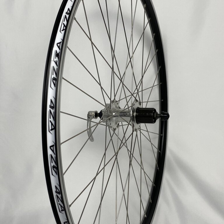 Roue arrière / 622 x 19C / Rigida - Ryde / ZAC Pro / Noir / Shimano / FH-C501 Nexave / Corps HG 35 mm / 135 mm / Frein sur jante ou disque (6 trous) / Tour