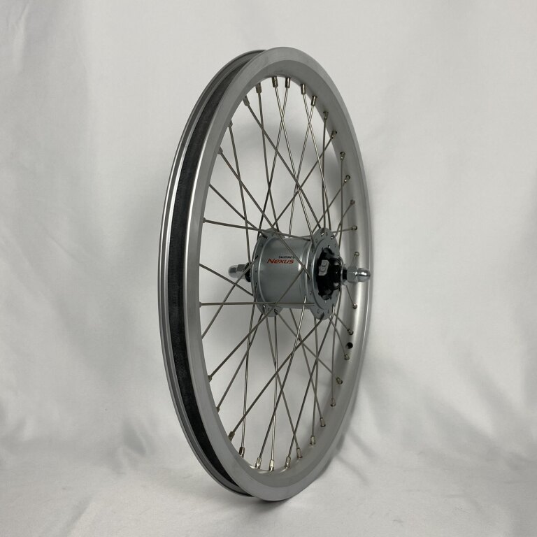 Voorwiel / 406X19C / Rigida - Ryde / Stratos / Zilver / Shimano / DH-C6000-3R-N 6V-3.0W Dynamo /  / 100 MM / Rollerbrake / Cargo